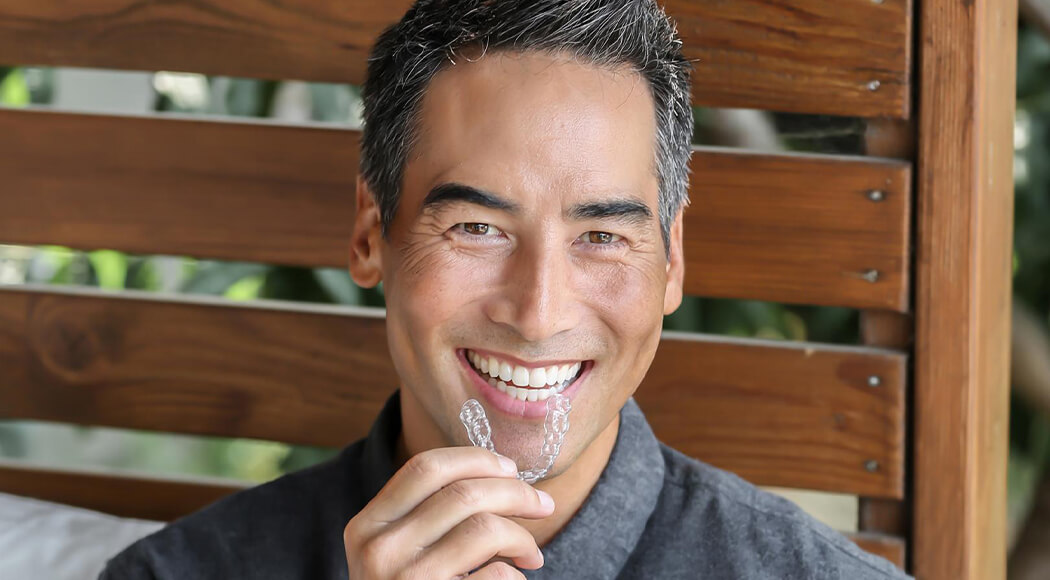 Retainers After Braces or Invisalign®: Will My Teeth Move Back?